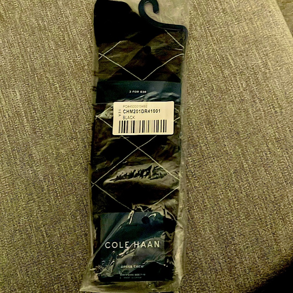Mens Cole Haan pair of sox. New with tags. Mens shoe size 7-12. Made in China
